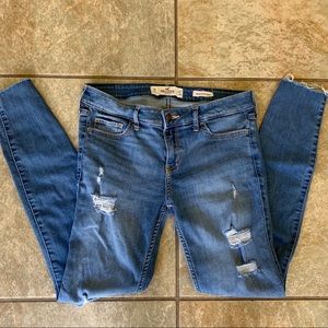 Low Rise Super Skinny Light Distressed Jeans